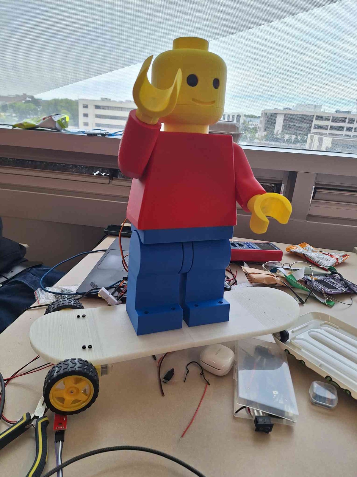Assembled B.O.B. on its skateboard base on the build desk