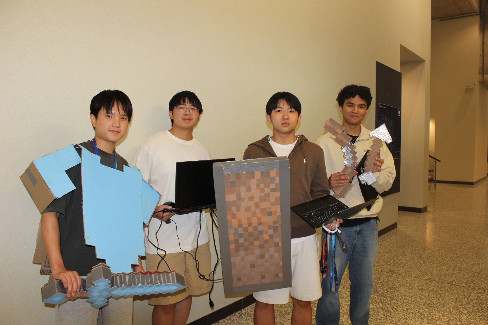 Cardboard sword, shield, and axe props